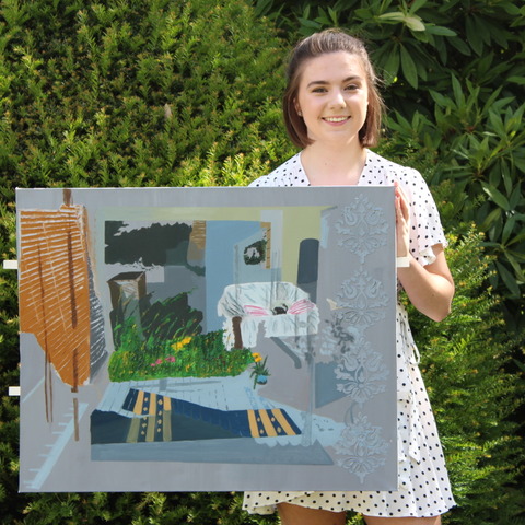 Evie with her winning Artwork