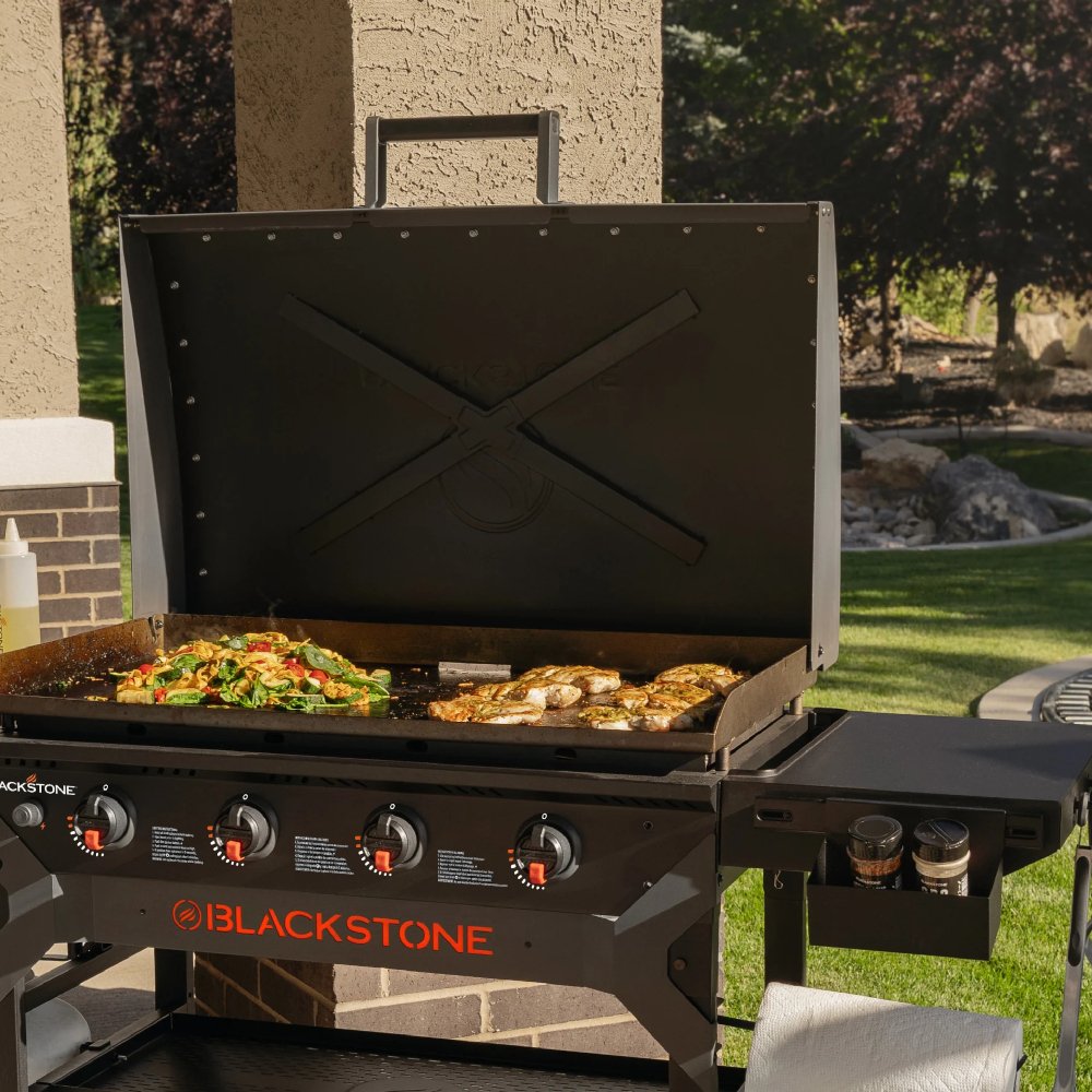 Blackstone 2310DK 28" Iron Forged Blackout Griddle Cooking Station with Hood 
