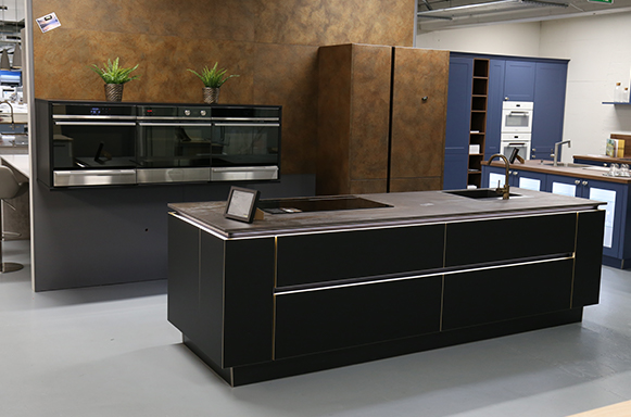 Flair with Trillium Dekton worktop. Corten Steel larder and panelling. Flair with Trillium Dekton worktop. Corten Steel larder and panelling.