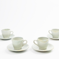 Espresso kop en schotel in levendige kleurnuances - poederblauw met dip