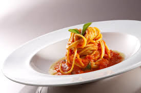 Pennette pasta with tomatoes sauce and basil