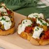 Melanzane al funghetto su crostini di pane