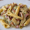 Garganelli con crema di carciofi e speck