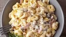 Tortellini panna e prosciutto e funghi