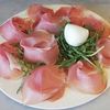 Crudo di parma su letto di rucola