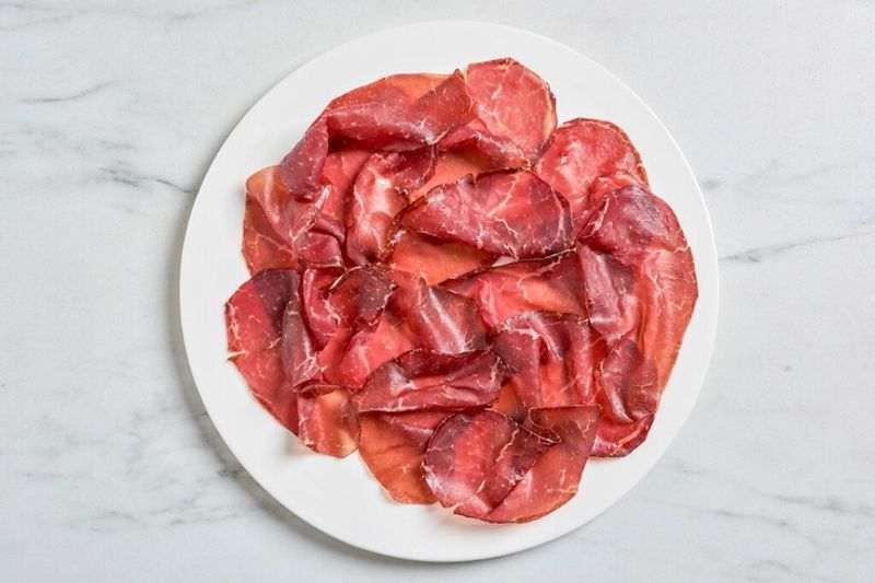 Bresaola(air-cured beef ) with oil and lemon