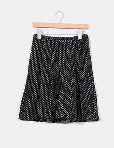 Falda negra y topos  de tablas  H&M