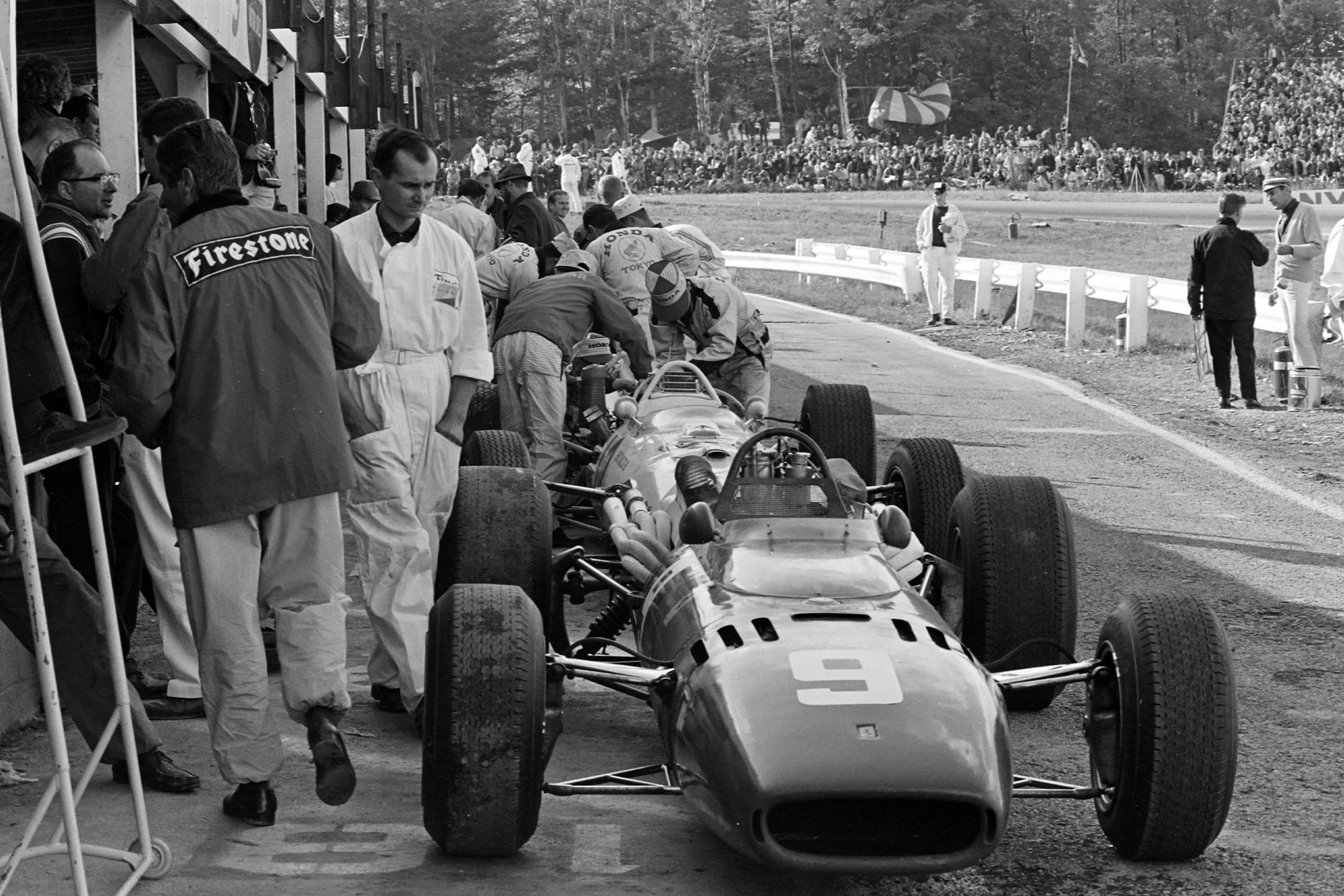 Lorenzo Bandini's Ferrari 312 in the pit lane.
