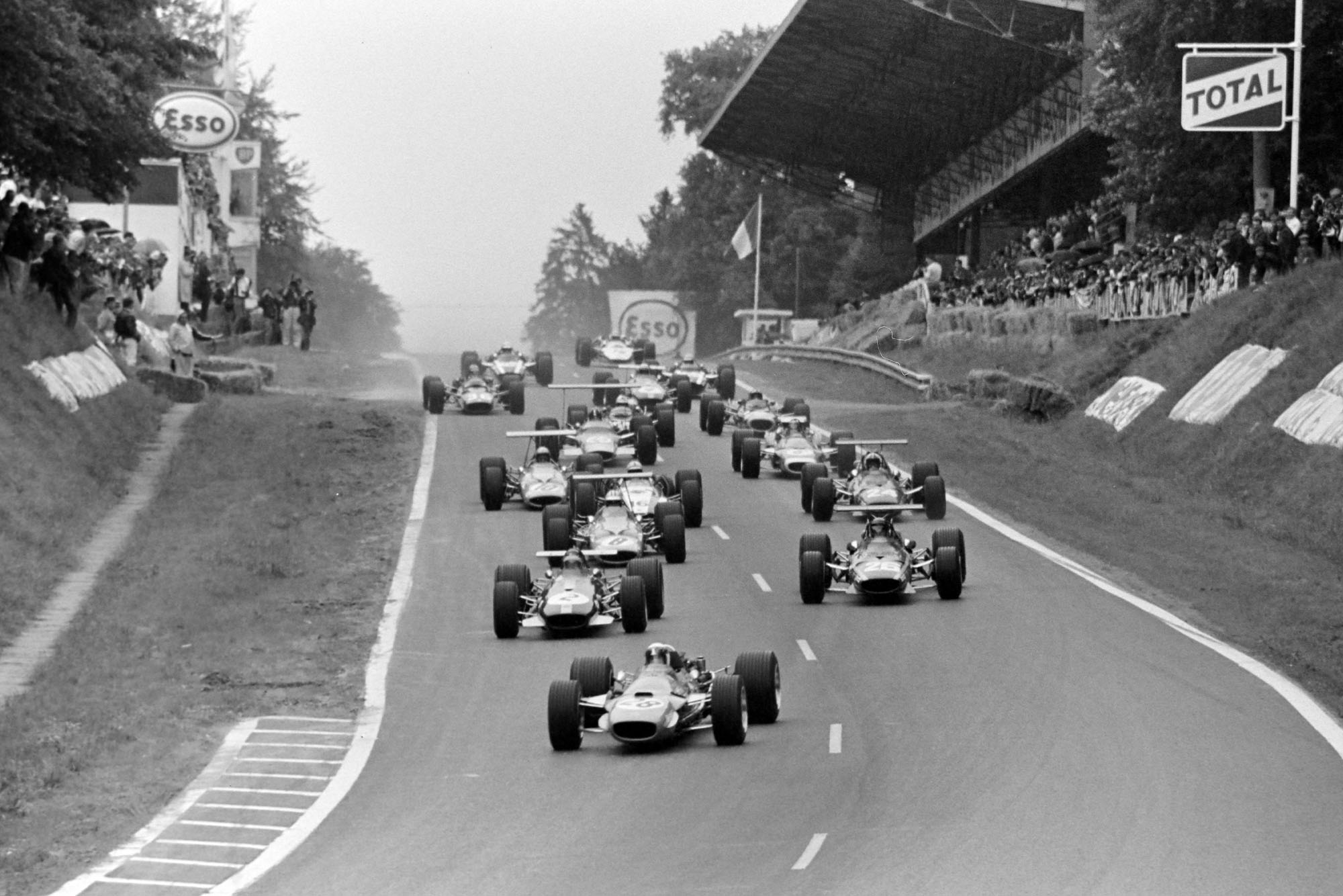 Jackie Stewart, Matra MS10 Ford, leads Jochen Rindt, Brabham BT26 Repco, and Jacky Ickx, Ferrari 312, at the start of the race.