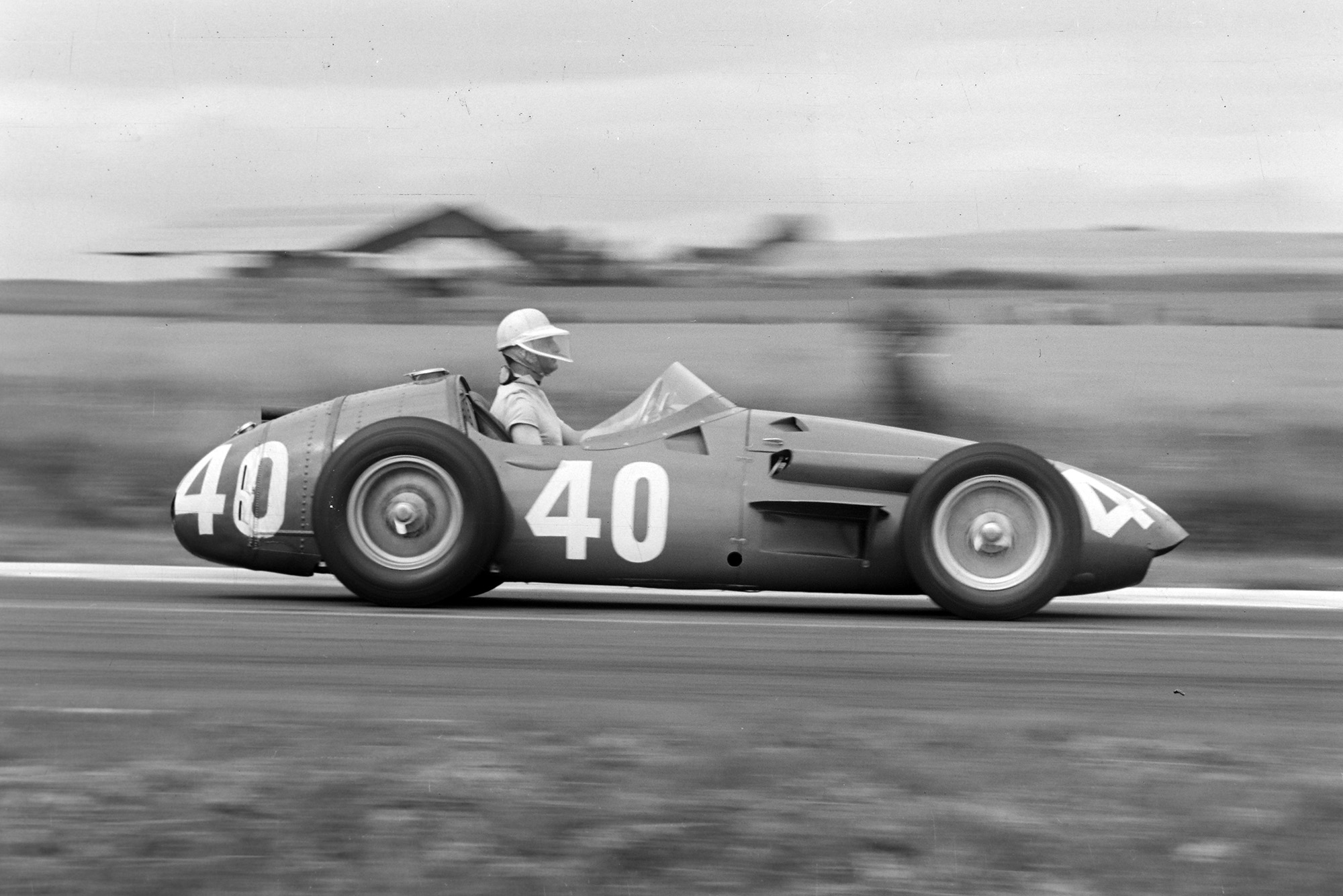 Godia-Sales heads down the straight in his Maserati