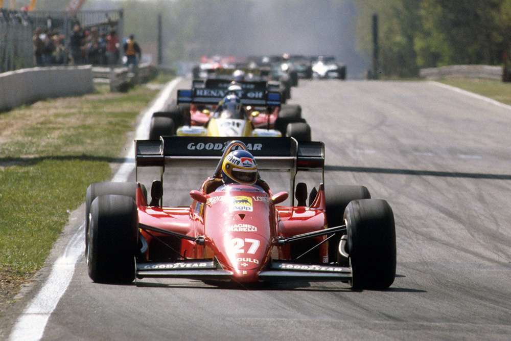 Michele Alboreto driving a Ferrari 126C4 in 1st position.