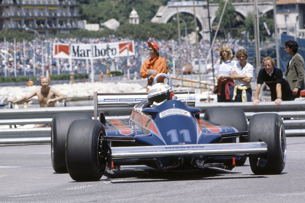 Elio de Angelis in a Lotus 87-Ford Cosworth, he later retired.