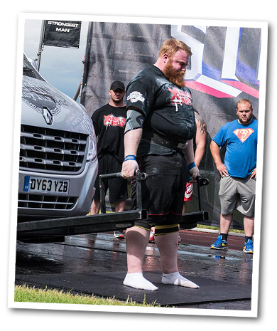 John Lifting a Car