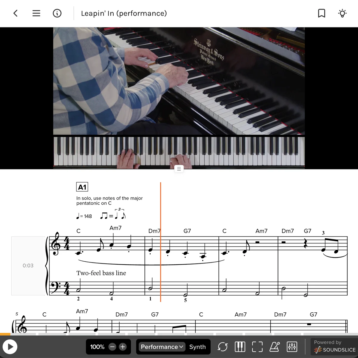 A piano lesson in the MusicGurus player, with the video above notation that scrolls in sync