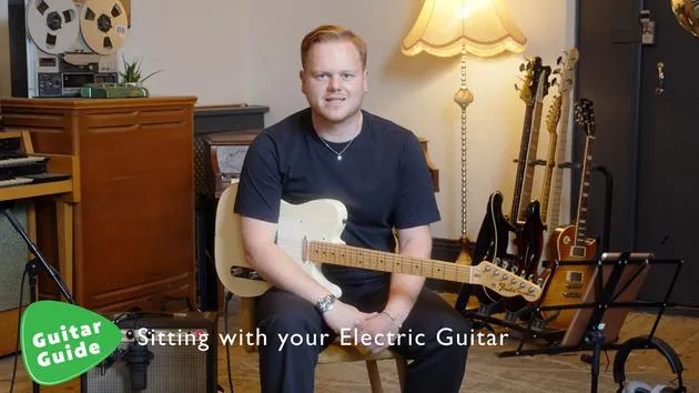 Das Sitzen mit deiner Gitarre (E-Gitarre)