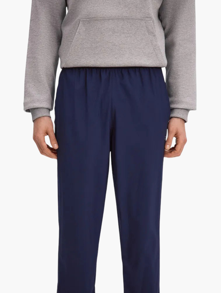 MyRunway | Shop Reebok Navy Train Woven Open Hem Pants for Men