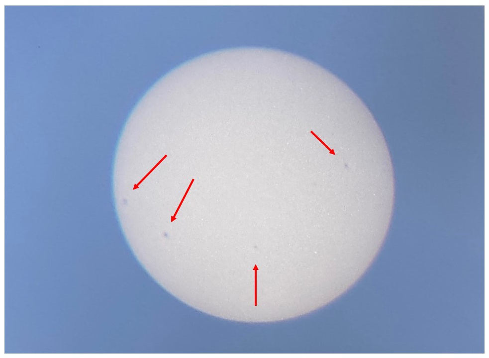 Afbeelding van de zon met zonnevlekken