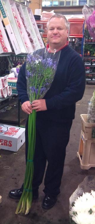 JUL-andy-with-agapanthus.jpg?mtime=20171003171807#asset:12850