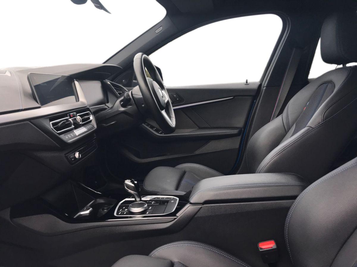 2024 BMW 1 Series BMW 1 SERIES 118i [136] M Sport 5dr Step Auto [LCP] Front sports seats, Height adjustable front head restraints, 3 rear seat head restraints, 3 seat bench in 2nd row, Driver and front passenger seat heating, Child seat ISOFIX attachment for two outer rear seats and front passenger seat with anchorage points, Single front passenger seat, M sport suspension, Anti roll bar front and rear, Drive Performance Control, Twin tube gas filled shock absorbers with degressive characteristic curve, On board computer, Personal Profile, BMW Teleservices, Optimum shift indicator, Oil sensor for level and grade, Check Control warning system for monitoring of lights and door/luggage compartment open warning, Integrated owners handbook, BMW ConnectedDrive online services, Rigidly mounted rear subframe - Multi link construction with separate spring / damper configuration and excellent driving characteristics, Locking wheel bolts, Central locking switch for all doors, fuel filler cap and luggage compartment, Thatcham Cat.1 alarm and immobiliser, Deadlocking function system to all doors, Remote control with integrated key with High-gloss Black inlay and M designation and 1 button for open/ close lock, window, open luggage compartment, Drive away locking system on all doors and luggage compartment with de-activated in iDrive settings, Wheel slip limitation close to the actuator (ARB), Start/stop button illuminated in centre console with keyless engine start and auto start stop deactivation button, Side impact protection, Seatbelt warning, Warning triangle and first aid kit, Tyre pressure monitoring system, BMW emergency call, 2 tone horn, Driver and front passenger seat belt security check, 3 point seatbelts on all seats, front pyrotechnic belt tensioners, stopper and belt force limiters, rear coded belt buckles, Child proof locking system in rear door, Crash sensor activating central locking release, hazard warning lights, fuel cut off, interior lighting + activation of safety battery terminal clamp, Airbags - Front driver/passenger, front and rear curtain head protection, front side, manual deactivation of front passenger airbag, Crash sensor activating of airbags, Unlocking doors, hazard warning lights, interior light, safety battery terminal, Anthracite headlining, Manual adjust steering wheel, Glove compartment, Front armrest, Multi-function controls for steering wheel, Folding rear clothes hook, Storage compartment in luggage compartment, Storage compartment in centre console, Front and rear door pockets with bottle holders, Conditioned based service, Four grab handles integrated in roof lining, Front and rear side armrest integrated into door trim, Driver and front passenger backrest net on rear, Dakota leather upholstery with perforation and contrast stitching, Driver side folding compartment in instrument panel, 12V power socket in front centre console with blanking plug, Type C two USB ports in rear centre console, Stowage of the parcel shelf in luggage compartment trim, 3 spoke sports leather steering wheel with black leather and stitching, pearl chrome decorative finish, specific M Badge, Two front centre console cupholders, Luggage compartment for bag hooks on left and right, foldable luggage compartment liner and two lashing eyelets, Luggage compartment for bag hooks on left and right, foldable luggage compartment liner and four lashing eyelets, Cargo function on 2nd seat row, Black boot net with lashing eyes, Body colour door handles, Shark fin antenna, Visible VIN plate, Front and rear bumper system with replaceable deformation elements, Lightweight engineering, Chrome 'M' logo side designation, Body colour roof trims, Fading support, Matt black air guide grilles, Chrome kidney grille frame with Satin Aluminium struts, Front door sill finishers in black plastic with M designation in metallic look, High gloss shadowline window frame, Recess cover mirror frames and B/C pillar embelisher trim, Model designation on electric bootlid, Chrome exhaust twin tailpipes round 90mm in left, Matt black wheel arch trim, Rear side wing doors, High level third brake light, Follow me home headlights, Automatic headlight beam throw control, Welcome lighting, LED daytime running lights, LED Headlights, LED front fog lights, Rear fog lights, Direction indicator side lights in exterior mirrors, Nearside reverse light in rear light cluster, LED eyebrow turn indicators, Preparation for high beam assistant, Auto dimming rear view mirror, Body colour mirror caps, Heated, electrically adjustable exterior mirror aspheric on driver side, convex on passenger side, Folding side mirrors with auto dimming/folding wing mirrors with auto dimming, Electrically adjustable exterior mirror with mirror adjustment switch on drivers armrest and aspheric on driver side, convex on passenger side, Cornering brake control, Dynamic Traction Control - DTC, Brake drying, Front and rear disc brakes, Anti lock braking system (ABS) with brake assist, Braking readiness, Dynamic stability control + (DSC+), City braking function, Electrically operated hand brake including automatic hold function, Comfort modes, Lane departure warning system, Cruise control with brake assist, Speed limiter, Attentiveness assist, Active guard plus, Cruise control with speed limiter, Front axle single joint with specific axle kinematics to minimise drive influences on steering + provide increased rigidity agile driving behaviour, Speed limit Info including no-overtaking indicator, Ambient interior lighting, DAB Digital radio, Stereo speaker system with 2 mid range speakers in the front door trims and rear parcel shelf + 2 central bass speakers underneath the front seats, Interior lights pack - 1 Series, Connected pack professional - 1 Series, M Sport exterior styling aerodynamics pack - 1 Series, Additional interior lighting pack - 1 Series, Additional storage compartment pack - 1 Series, BMW live cockpit professional pack- 1 Series, Additional storage compartment pack with code 493 -1 series, Electronic differential lock, 7 speed automatic transmission with double clutch technology, Petrol Particulate Filter, High precision injection, Balancer shaft, VALVETRONIC engine management, Aluminium lightweight construction, Double VANOS twin scroll turbocharging system, Velour floor mats, Floor mats in anthracite velour with contrasting colour seam to match contrast stitching on instrument panel, Rear window wiper, Green tinted heat protection glazing, Front and rear electric windows with open and close fingertip control, anti trap facility and comfort closing, Automatic windscreen wipers and automatic headlight, Integrated front windscreen with washer jets, Reduced rolling resistance tyres, Electrically powered 12V compressor, Eco pro mode, Pull away assistant, Two zone automatic air conditioning, Contrast stitching on instrument panel, 18" Burnished M double spoke bi-colour alloy wheels finished in orbit grey - style 819M, Sun visors with vanity mirrors and insert tab, Bluetooth / WiFi interface for wireless connection of mobile terminal devices and audio streaming, Trailer stabilisation logic - vehicle photo 5 for sale on PureCar