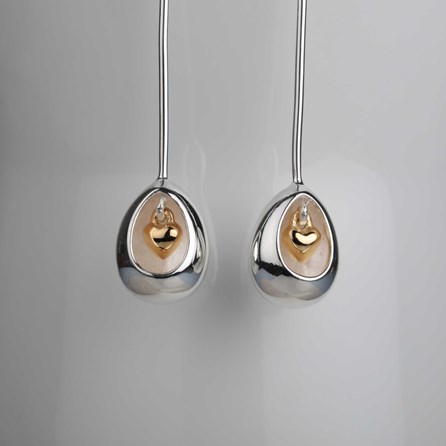 Oval Earrings With Miniature Hanging Heart Oval Earrings With Miniature Hanging Heart Silver