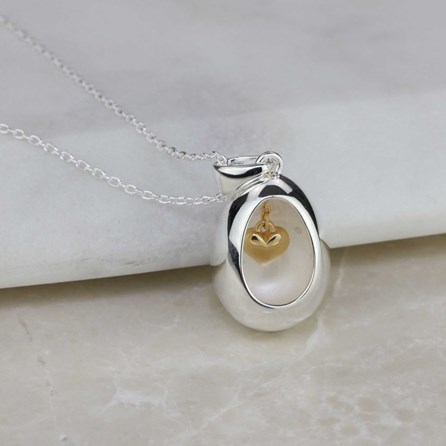 Oval Pendant With Miniature Hanging Heart Oval Pendant With Miniature Hanging Heart Silver