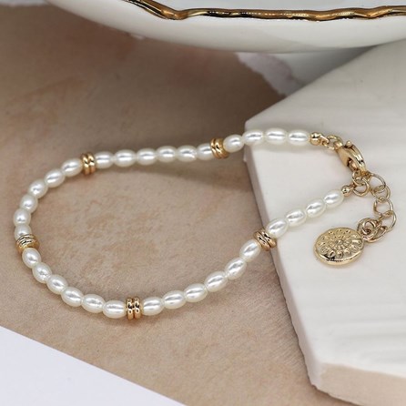 Seed Pearl and Faux Gold Spacer Bead Bracelet Seed Pearl and Faux Gold Spacer Bead Bracelet