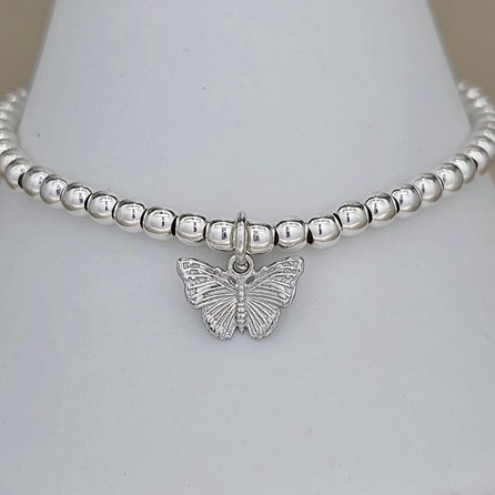 Skinny Bead Bracelet with Sterling Silver Butterfly Charm Skinny Bead Bracelet with Sterling Silver Butterfly Charm