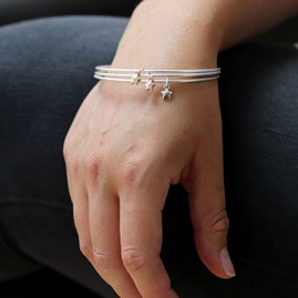 Triple Silver Plated Bangle Set with Star Charms Triple Silver Plated Bangle Set with Star Charms