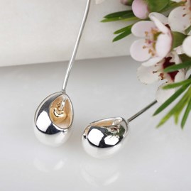 Oval Earrings With Miniature Hanging Heart Oval Earrings With Miniature Hanging Heart Silver