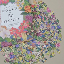 Around the World in 50 Orchids 1000-piece Jigsaw Puzzle Around the World in 50 Orchids 1000-piece Jigsaw Puzzle