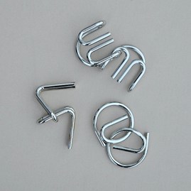 Einstein's Metal Puzzles Set Of Three Einstein's Metal Puzzles Set Of Three