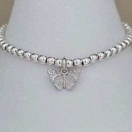 Skinny Bead Bracelet with Sterling Silver Butterfly Charm Skinny Bead Bracelet with Sterling Silver Butterfly Charm