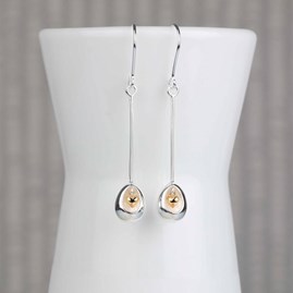 Oval Earrings With Miniature Hanging Heart Oval Earrings With Miniature Hanging Heart