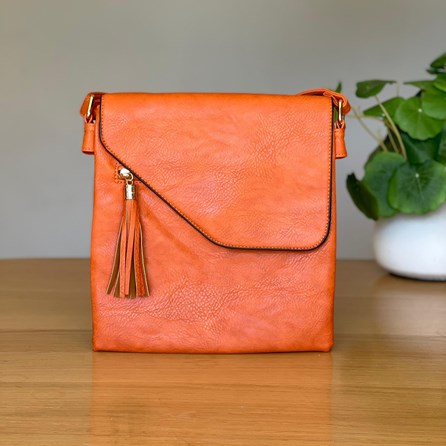 Cross Body Bag With Tassel in Orange Gifts For Women Handbags And Accessory Gifts Cross Body Bags Orange Zip Fold Over With Tassel