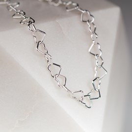 Solid Silver Interlocking Hearts Bracelet