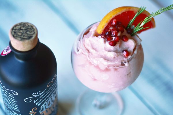No Churn Pink Grapefruit, Pomegranate, and Rosemary Gin Sorbet