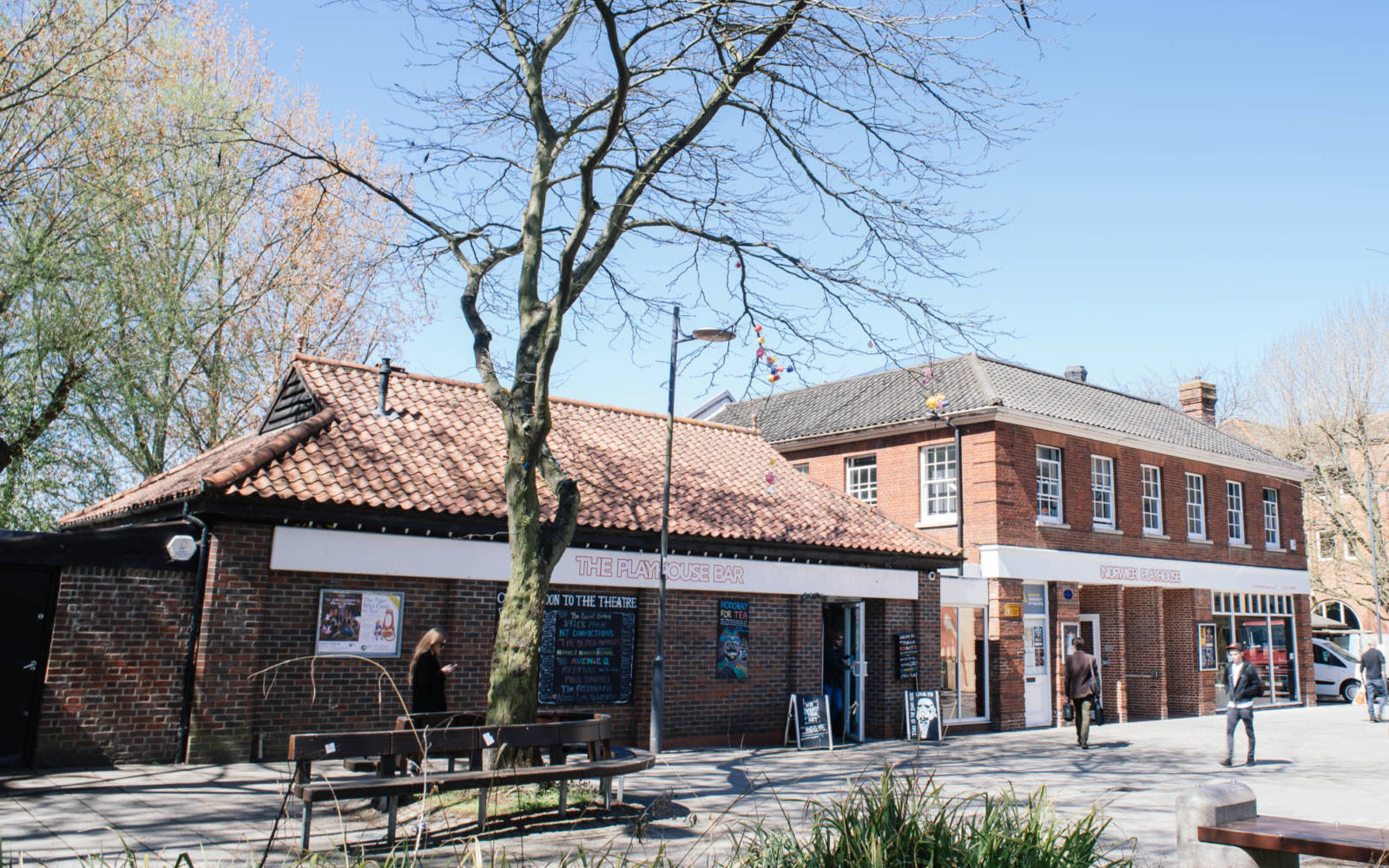 Photo of the front of Norwich Playhouse, taken on a sunny day.