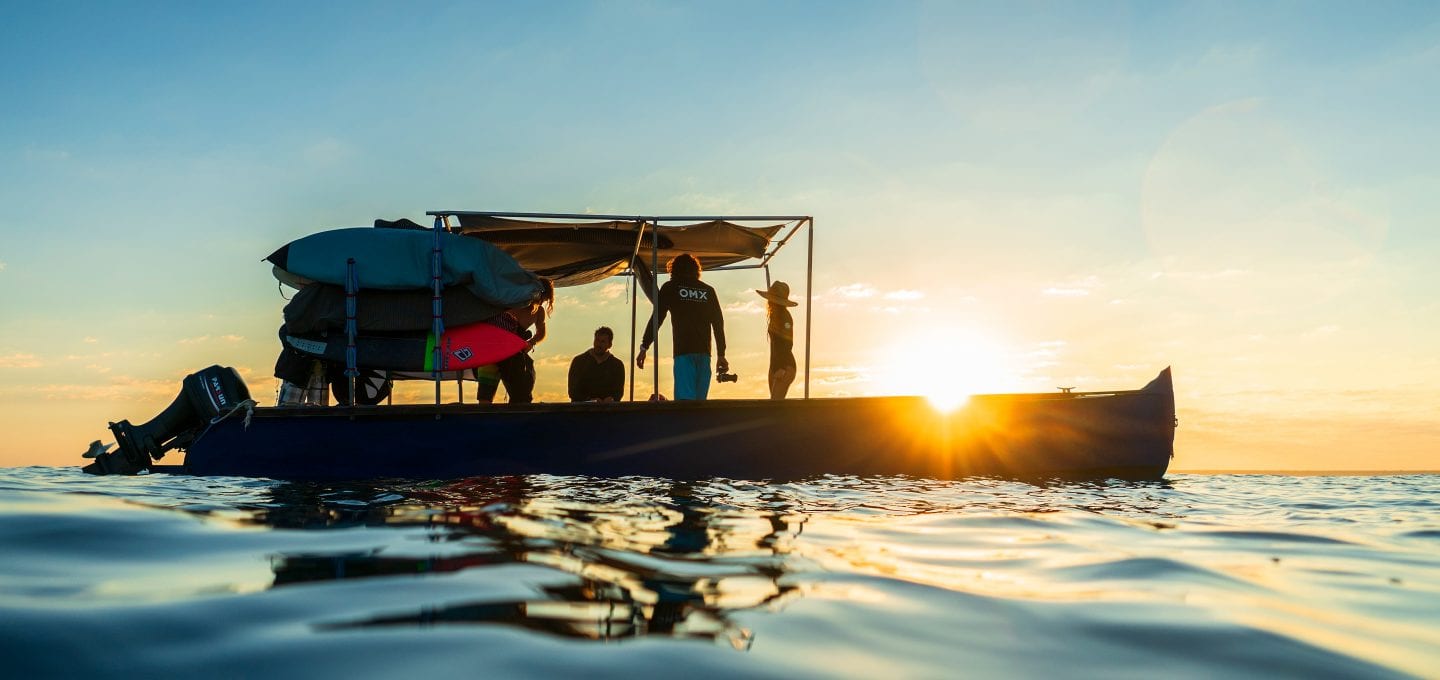 surfing in Madagascar boat