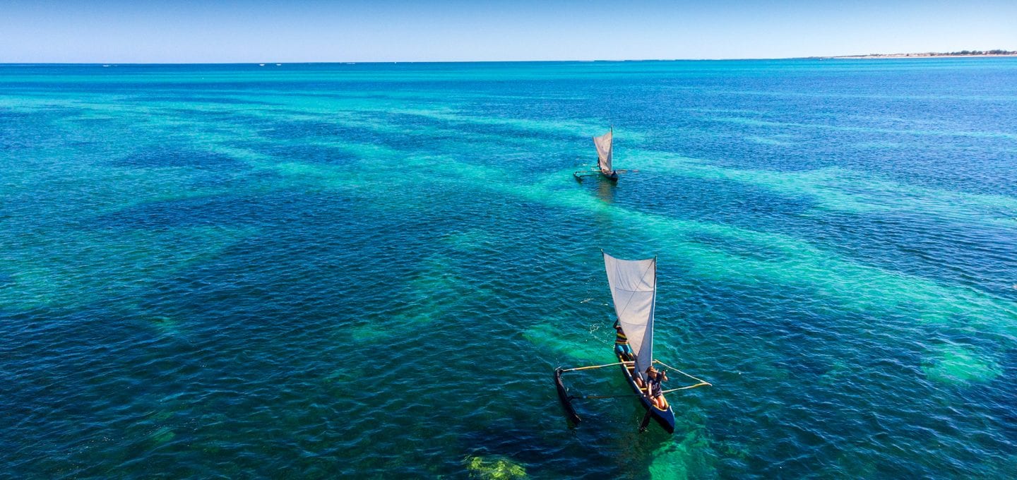 surfing in Madagascar boats