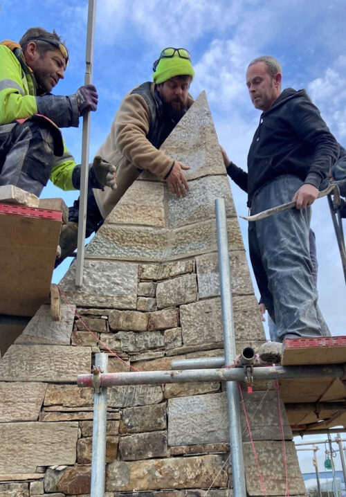 Stone Vessel: Capstone lifted in place