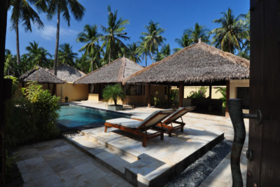 View of pool area at the Kura Kura Resort in Java