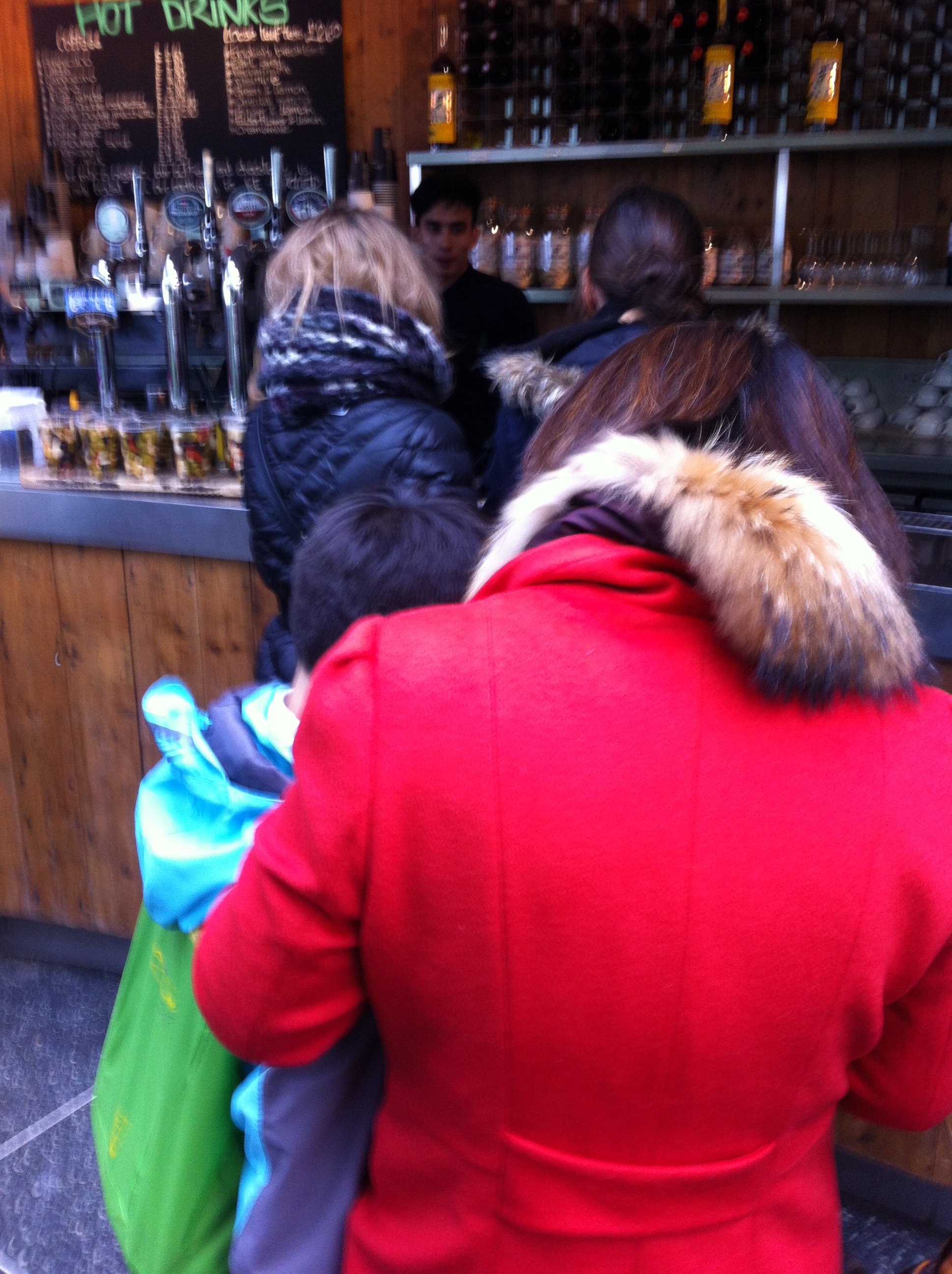 People waiting in a queue in London (where else?)