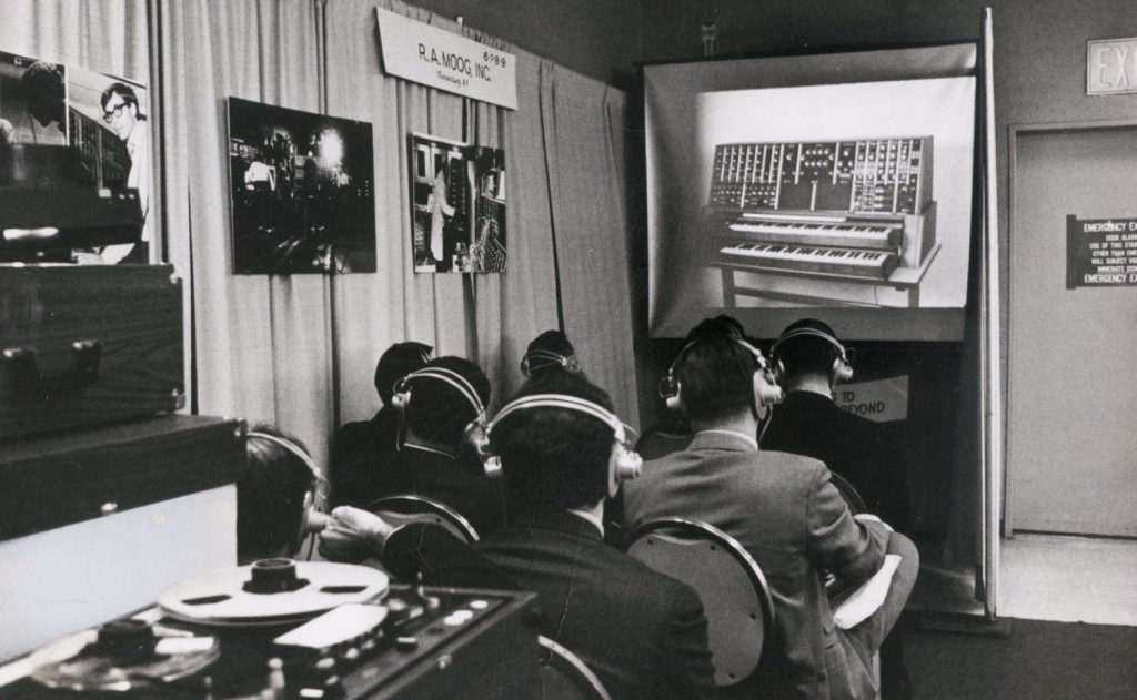 Moog Synthesizer – 60s Sounds of Change by gilad oshri - Illustrated by In the cover photo, Robert "Bob" Moog and Wendy Carlos - Ourboox.com