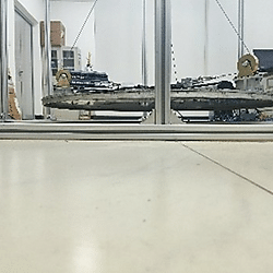 Analysis of kinematics and leveling performance of a novel cable-driven parallel automatic leveling robot for spacecraft hoisting