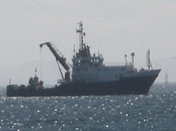 Big Work Boat In The Flow.
