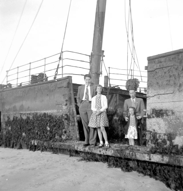 Boat wreck at barrier
