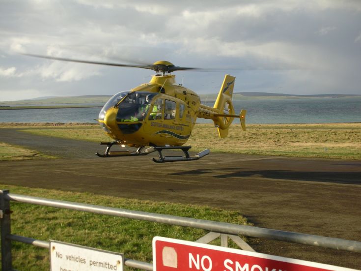 Ambulance helicopter at Stronsay Airfield.