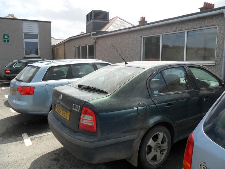 Cars covered in volcanic ash