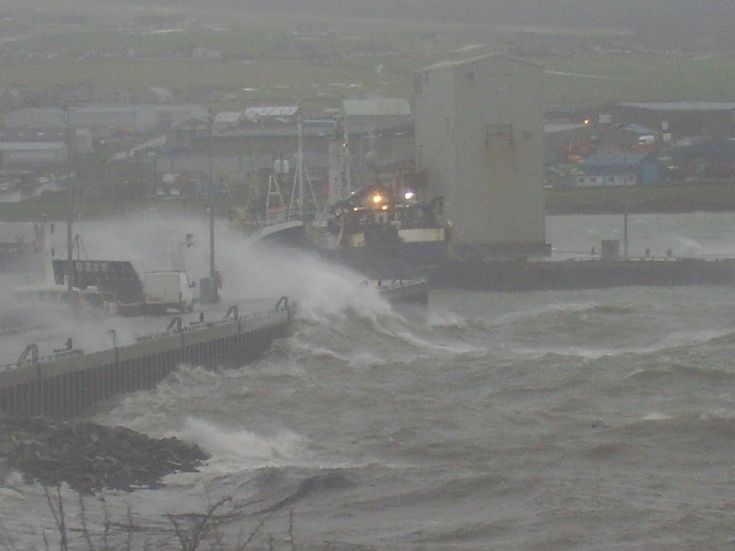 White van man's wash on Kirkwall pier.