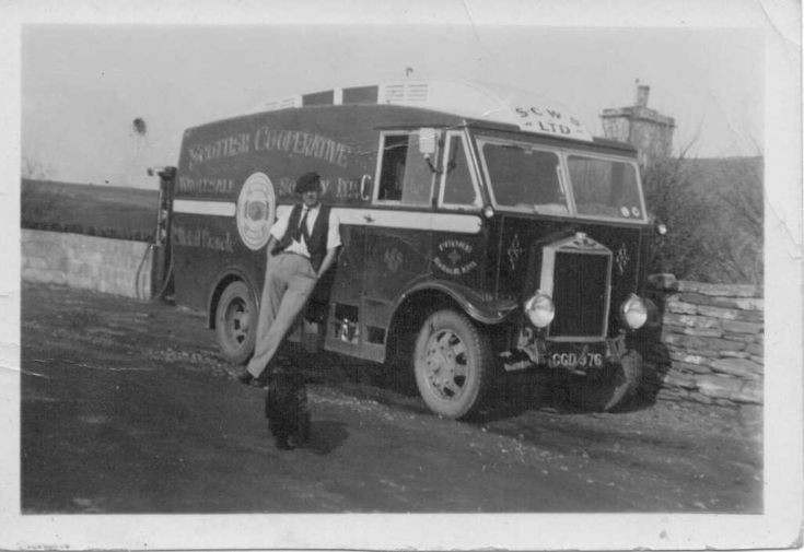 Bill Leslie with Cooperative van